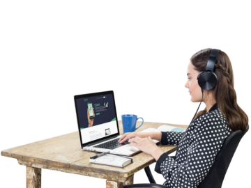 Software engineer at a desk working on the be safe website